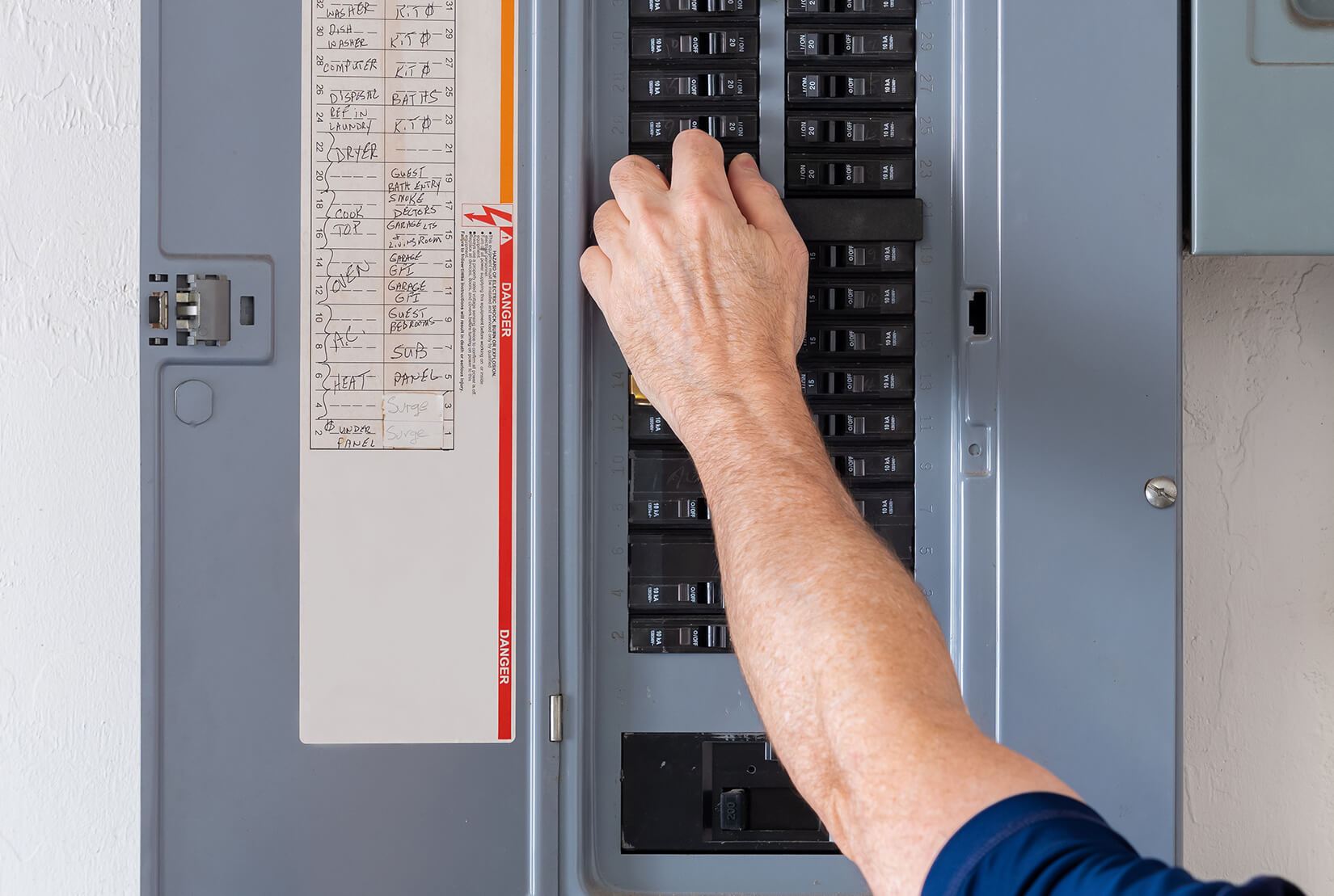 electrician upgrading a residential electrical panel in denver
